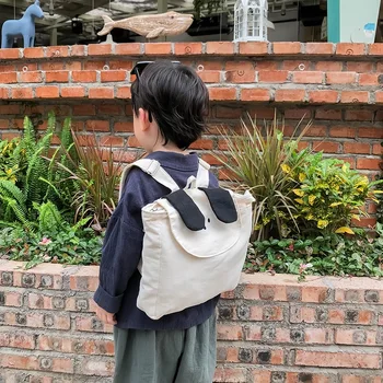 Детский рюкзак 2023 года, новый модный простой холст в корейском стиле для мальчиков и девочек, учеников детского сада, повседневный школьный рюкзак для детей